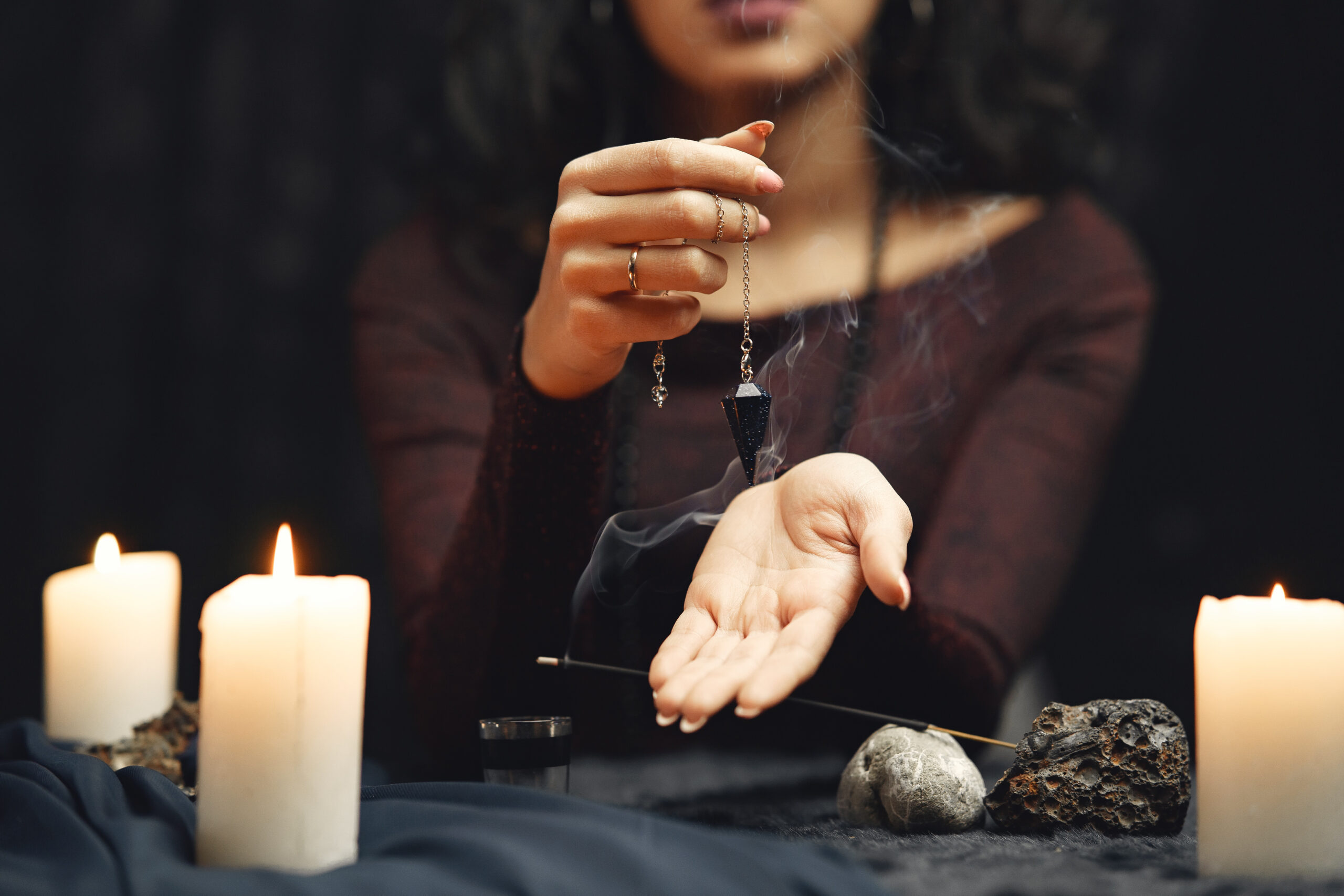 portrait of fortune teller in a dark room